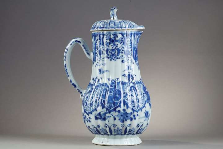 Blue and white porcelain jug and cover